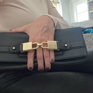 JC LEATHER CLUTCH BAG